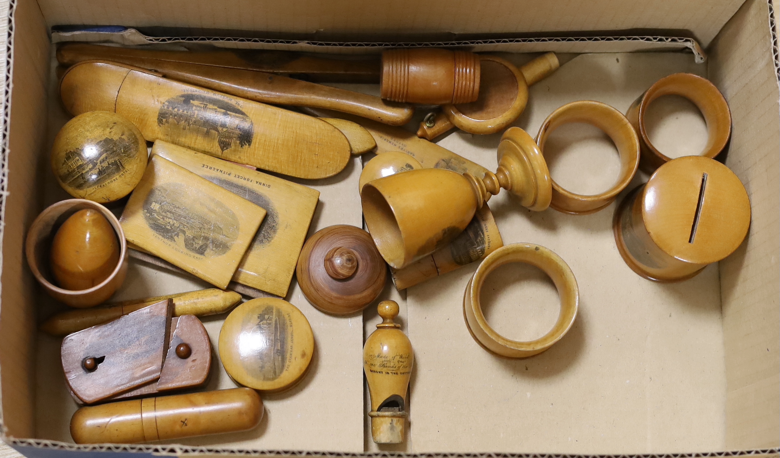 A collection of mixed Mauchline wares Including napkin rings and miniature boxes